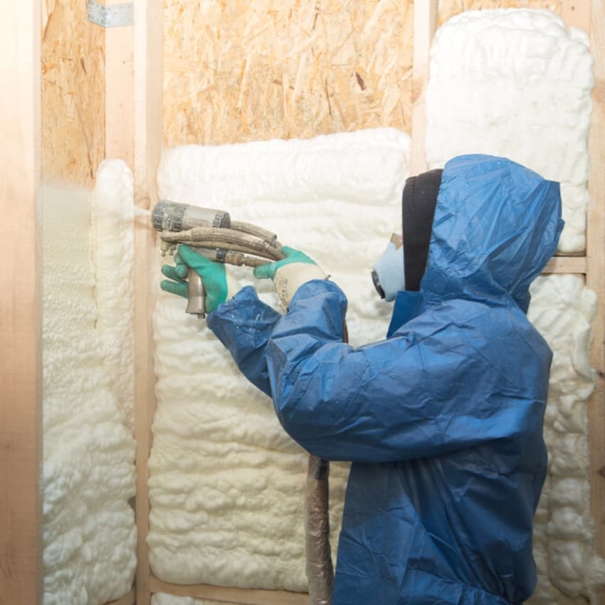 installing spray foam insulation into a wall in South Florida