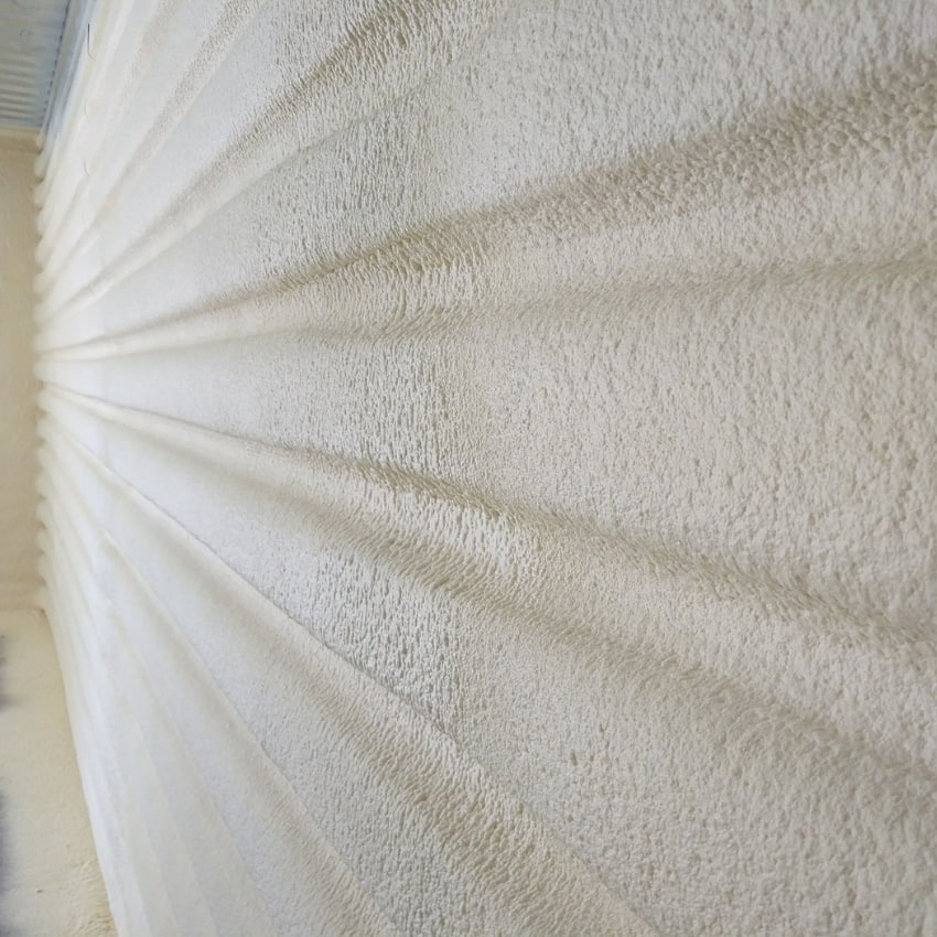 Installing metal building spray foam insulation in South Florida