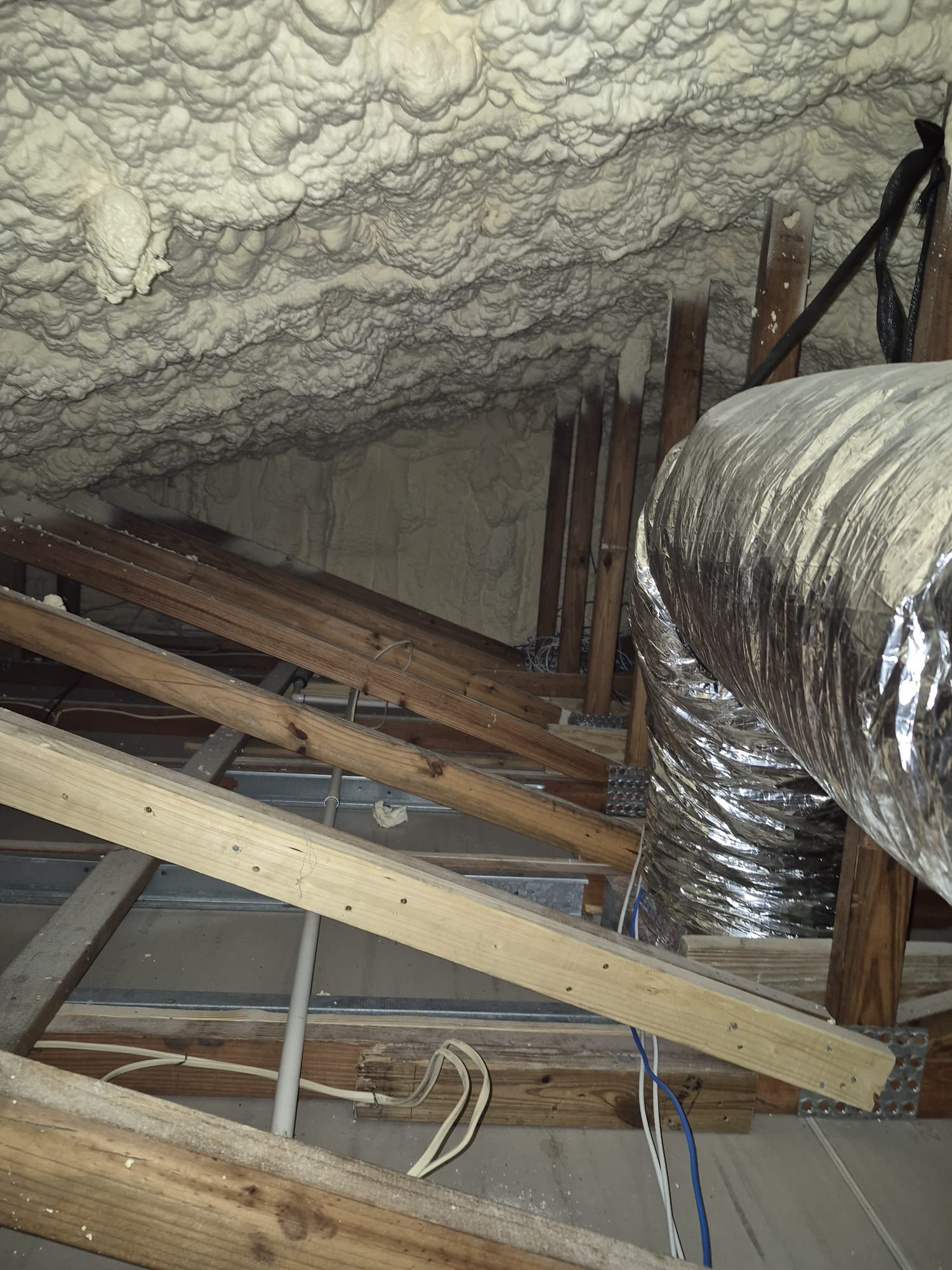 Sweating AC duct and attic water damage example